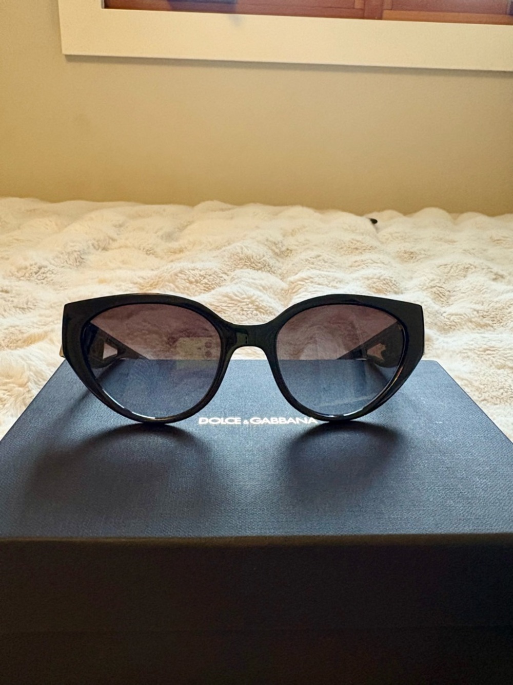 Dolce & Gabbana Black Cat-Eye Sunglasses with Gold Accents - Picture 2 of 4